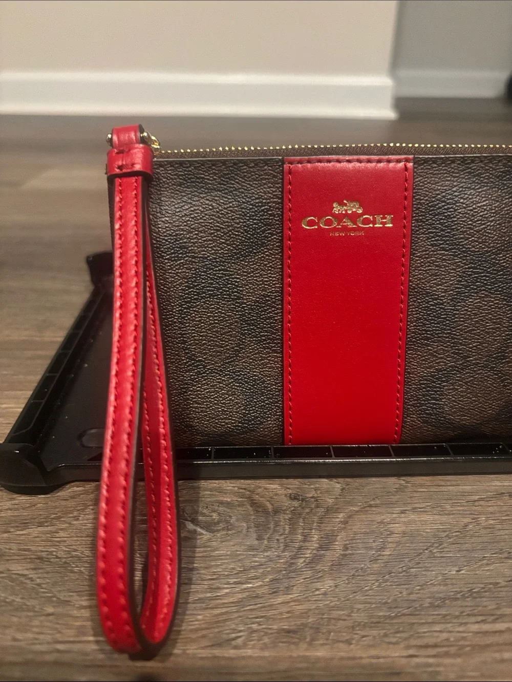 Coach Brown Signature Wristlet with Red Center Stripe